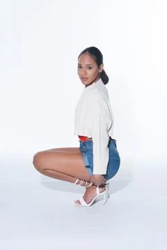 Photo of young model in studio on plain background Stock Photos