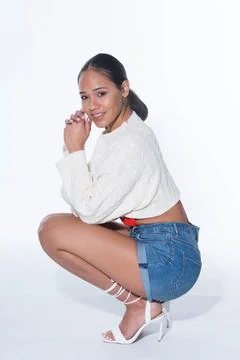 Photo of young model in studio on plain background Stock Photos
