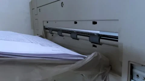 Photocopier printing documents. Office laser jet printer printing a lot of Stock Footage 258575677