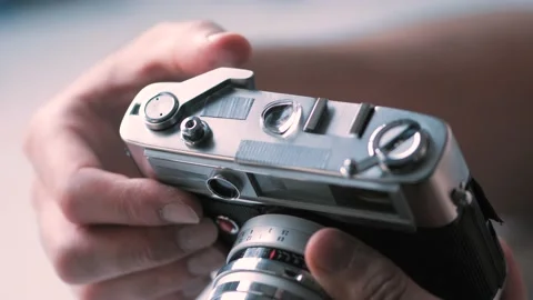 Photograph Adjusting an Old Camera Settings closeup Stock Footage 132041821