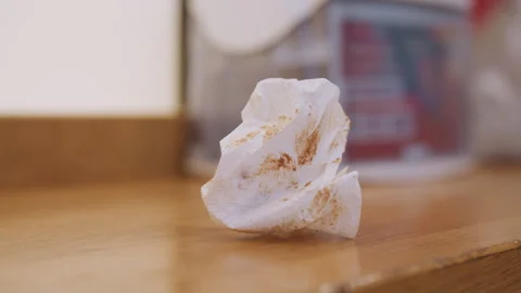 Photograph capturing used tissue in cozy home environment with details. Detailed Stock Footage 341769514