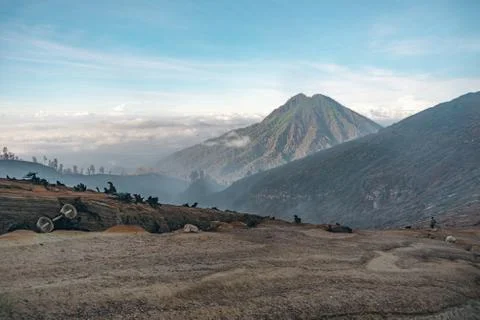Photograph of high volcano with clouds on Java island Stock Photos
