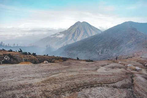Photograph of high volcano with clouds on Java island Stock Photos