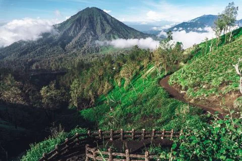Photograph of high volcano with clouds on Java island 스톡 사진