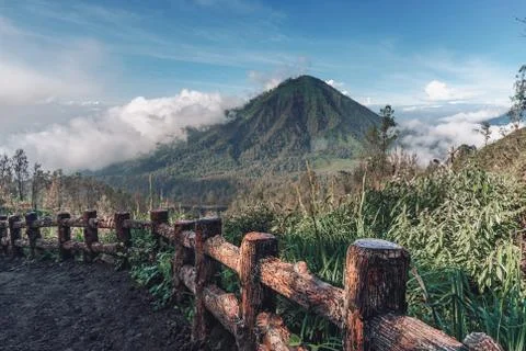 Photograph of high volcano with clouds on Java island Stock Photos
