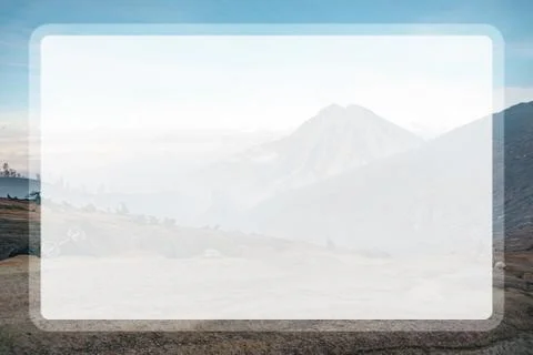 Photograph of high volcano with clouds on Java island in a transparent window Foto stock