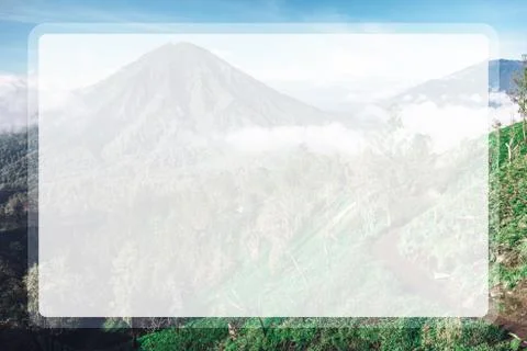Photograph of high volcano with clouds on Java island in a transparent window Stock Photos