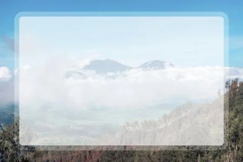 Photograph of high volcano with clouds on Java island in a transparent window Foto stock