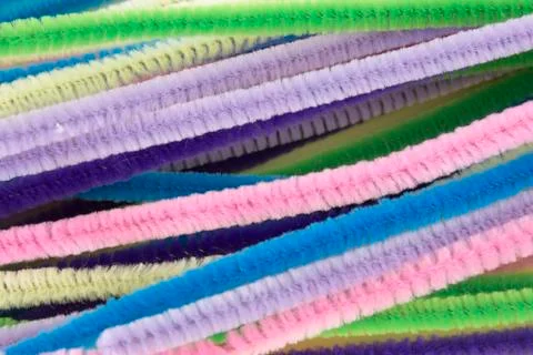 This is a photograph of Pastel colored pipe cleaners Stock Photos