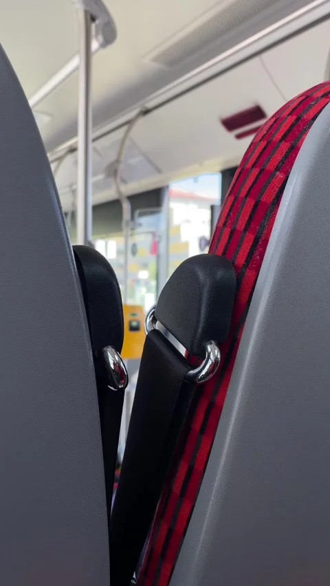 Photograph of seat elements inside vehicle with urban scenery behind Vidéo 335359370