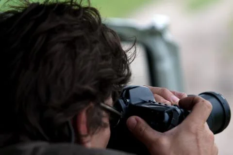 Photographer in action Stock Photos