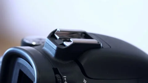 Photographer Adjusts the Camera Flash before Shooting. 4K Stock Footage 47443256
