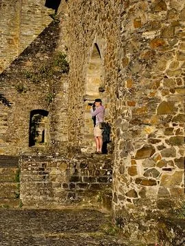 Photographer between the stone Stock Photos
