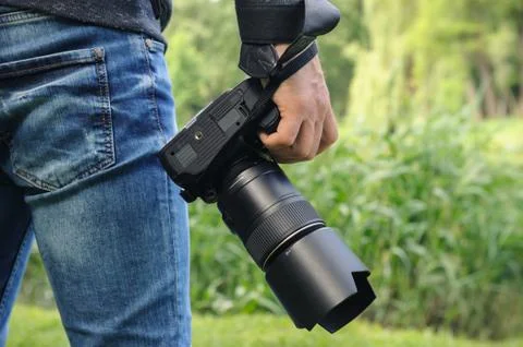 Photographer with the camera. Stock Photos