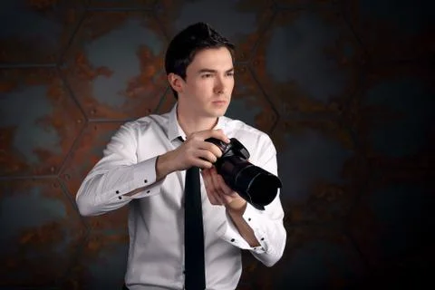 Photographer with camera in studio Stock Photos