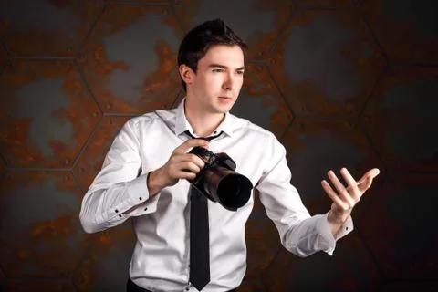 Photographer with camera in studio Foto stock