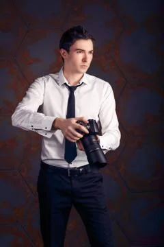 Photographer with camera in studio Foto stock