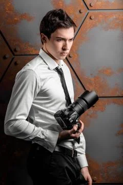 Photographer with camera in studio Foto stock