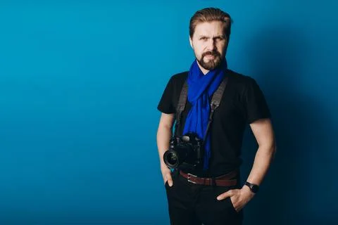 Photographer with camera in studio Stock-Fotos