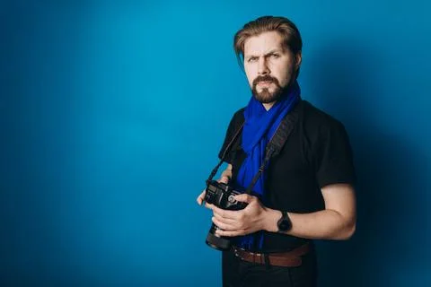Photographer with camera in studio 스톡 사진