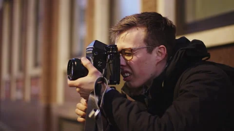 Photographer with Camera on Tripod Stock Footage 147939739