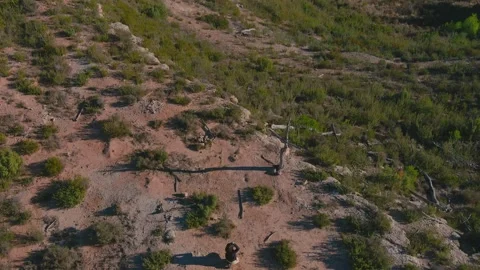 Photographer Capturing a Cross: Elevated Aerial View in the Mountains Stock Footage 263028662