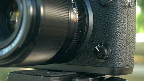 Photographer changes camera focus mode. Stock Footage 116965084