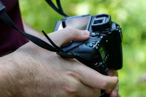 Photographer is checking the screen of his camera Stock Photos