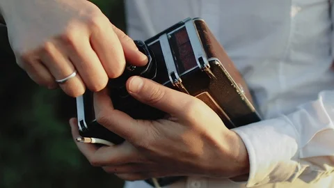 Photographer customizes large format camera Stock Footage 105498723