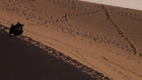 A photographer in the desert Stock Footage 77092628
