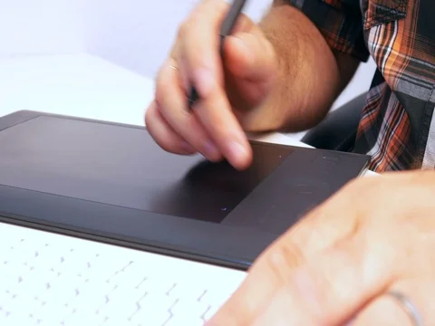 Photographer, designer in the work with the tablet Stock Footage 77861253