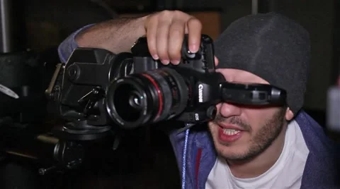 Photographer directing on set with a dslr. Stock Footage 50148126