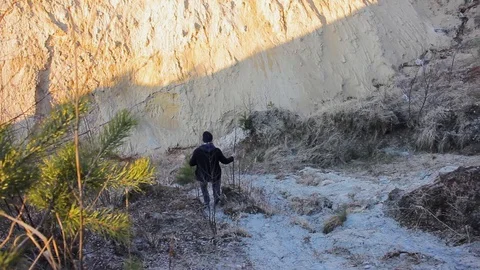 Photographer explore landscape on Sandstone cliffs valley Stock-Footage 127717592