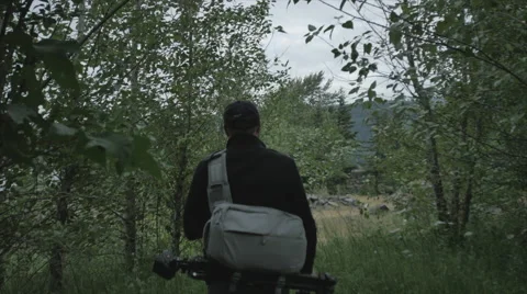 Photographer exploring landscape 3 Stock Footage 44350973