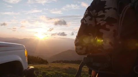 Photographer fixing digital camera on the tripod stand in slow motion Stock Footage 71568328