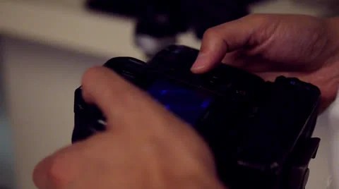Photographer holding his camera Stock Footage
