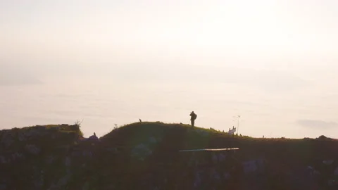 Photographer on mountain peak Stock Footage 145431005