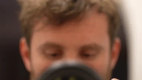 Photographer moving camera away from face Stock-Footage 328400843