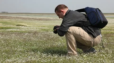 Photographer in a nature Stock Footage 24653485