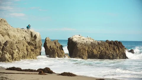 Photographer at ocean Stock Footage 75791169
