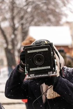 Photographer with an old camera close up Stock Photos