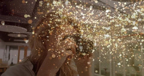 Photographer pressing shutter on mirrorless camera showcasing golden sparkles Stock Footage 314148490