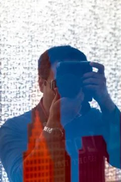 Photographer reflection Stock Photos