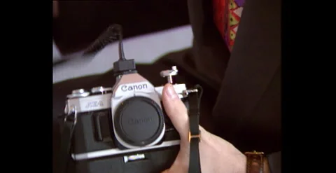 Photographer Setting Up Camera on Location (1994) Stock-Footage 310928279