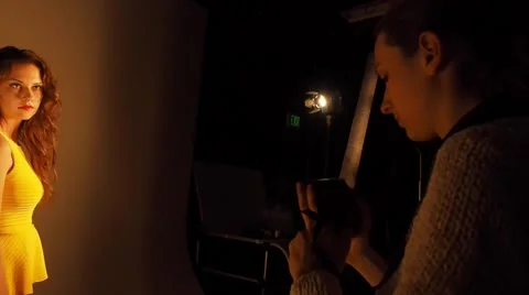 Photographer shooting model Stock Footage 56680002