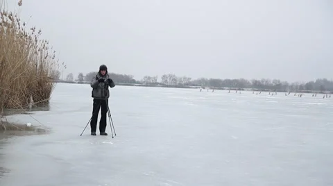 The Photographer Is Standing In Ice Stock Footage 60210619