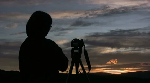 Photographer at sunset Stock Footage 28796958