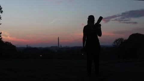 Photographer at sunset  Stock Footage 137214329