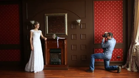 Photographer taking pictures the bride Stock Footage 80605317