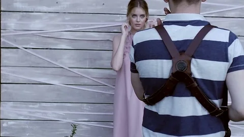 Photographer talks to the model Stock Footage 79594271